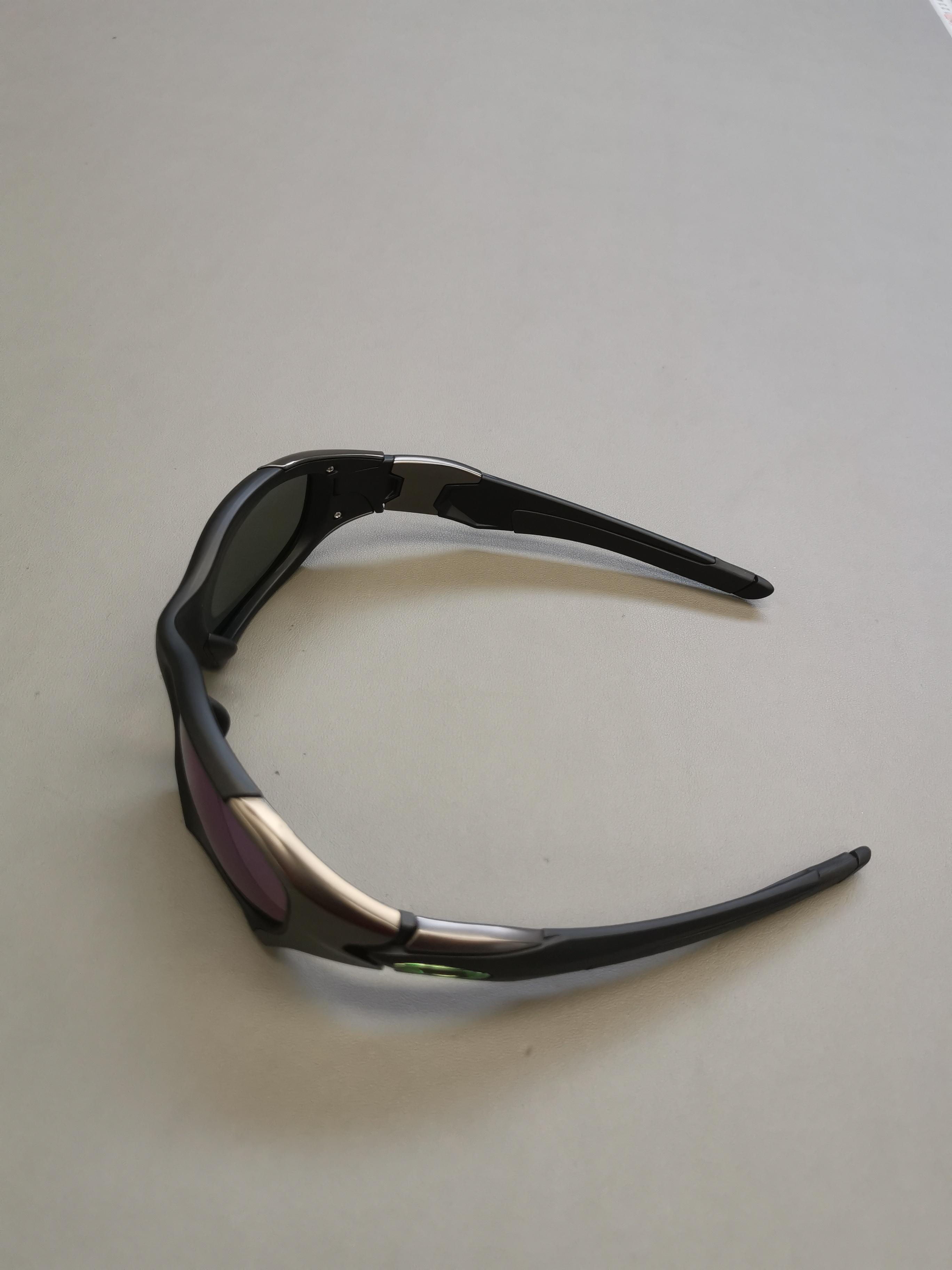 Oakley-style sunglasses via OrientDig to the UK — small-parcel reality check